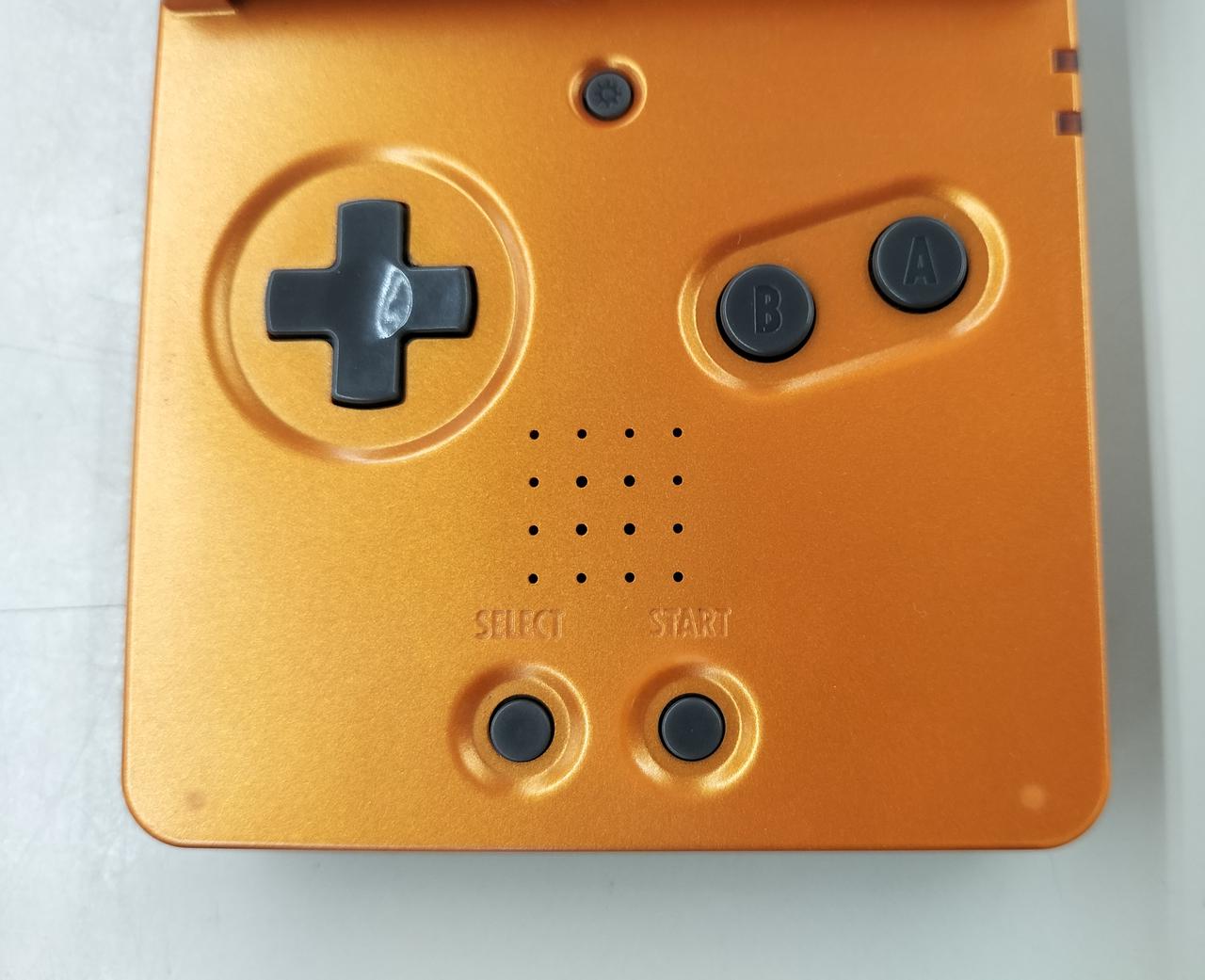 Nintendo Gameboy Advance SP Achamo Orange AGS-001 Used in Nintendo Gameboy Advance SP Achamo Orange AGS-001 Used in